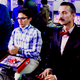Jose Ramon Navarrete (R) plays King of Fighters.